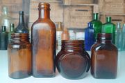 471 - Set of 4 Vintage Amber Glass Screw Top Collectible Decorative Bottles