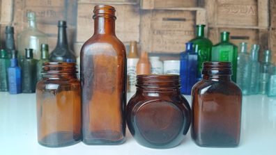 471 - Set of 4 Vintage Amber Glass Screw Top Collectible Decorative Bottles