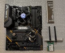 Asus Tuf Motherboard + Intel i7 9700k + 256gb ssd + Cpu Cooler + wifi card = Bundle