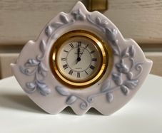 Rare Vintage Lladro Marbella Quartz Desk Clock (5652)  crafted from glazed white porcelain with delicate blue floral details and a gold rimmed face.