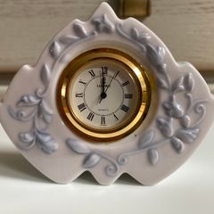 Rare Vintage Lladro Marbella Quartz Desk Clock (5652)  crafted from glazed white porcelain with delicate blue floral details and a gold rimmed face.