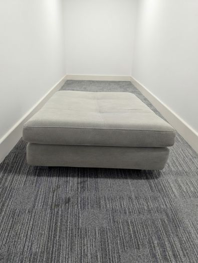 pouffe grey sitting