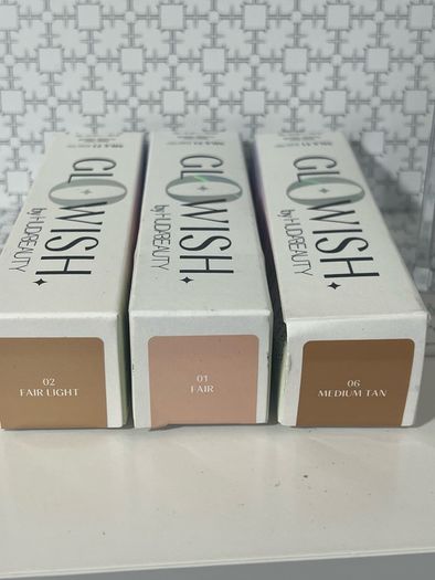 Huda beauty GlowWish multidew skin tints and huda beauty water belly primer