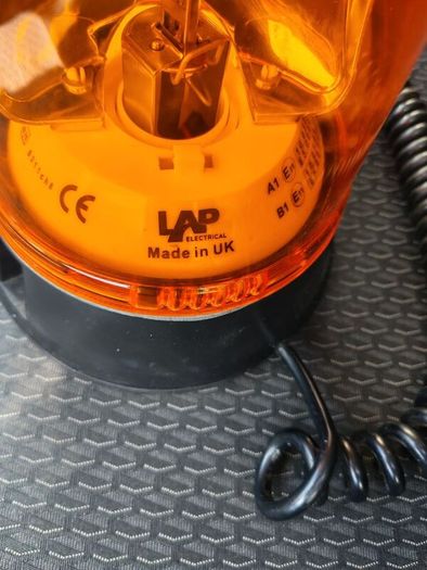 Lap rotating orange beacon