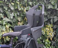 Bicycle child seat carrier. Bracket