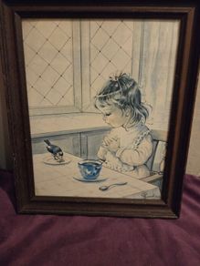 Vintage Girl Feeding Bird Framed print