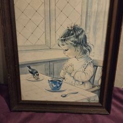 Vintage Girl Feeding Bird Framed print