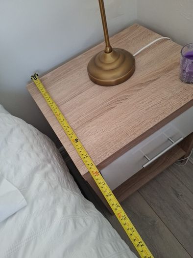 Timer and white wardrobe and bedside locker