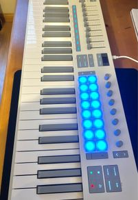 Novation Launchkey 49 Mk4 with stand and dust cover