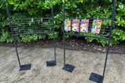 Black Grid Wall Shop Display Stand - Signage Space Above