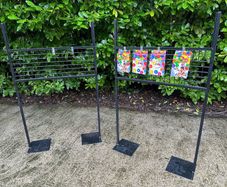 Black Grid Wall Shop Display Stand - Signage Space Above