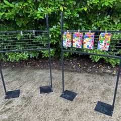 Black Grid Wall Shop Display Stand - Signage Space Above