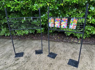 Black Grid Wall Shop Display Stand - Signage Space Above