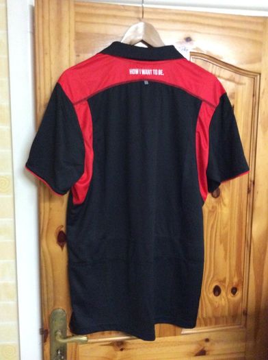 St. Kilda Aussie Rules Football Club.Official BLK Mens Polo Shirt. Melbourne Australia.