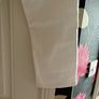 Size 12, white jeans, ankle length. Image 4