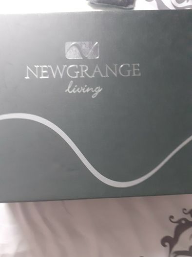 Newgrange candle holders .New in box black and glass .Would make a lovely gift