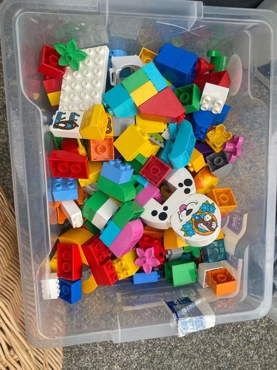 Box of Lego. 4 Figures and 4 Small Base Plates