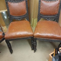 Four antique chairs one needs repairing