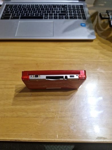 Nintendo 3DS Metallic Red with the original box, charger, and booklets