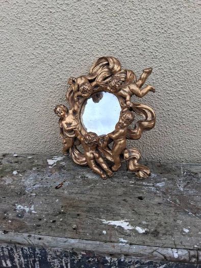 baroque cherub mirror