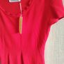 Red knitted short sleeve top fits size SM new Image 4