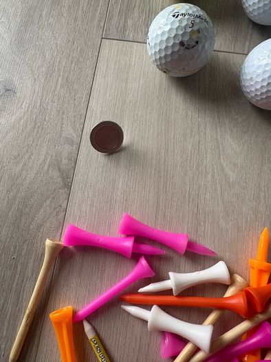 Bundle of Golf Balls, Tees and a ball marker