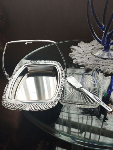 Vintage English glass butter dish with chrome finish, glass insert and butter knife.
