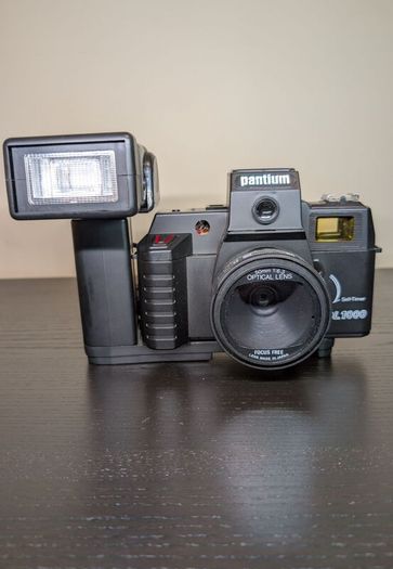 PANTIUM Film camera with flash and original camera bag.