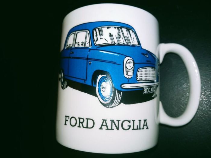 collection of six automotive mugs