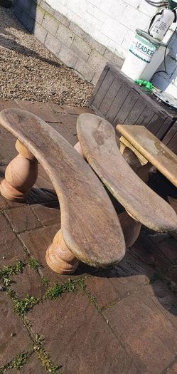 Sandstone garden table and two benches.