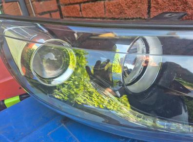 kia sportage  drivers headlight 2014