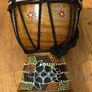 This is a small hand-carved Australian drum with a hand-painted turtle design Image 2