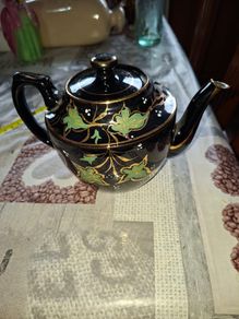 Antique Black-Glazed Ceramic Teapot, likely in the style of Victorian Jackfield-ware 19th-to-20th-century Postage Available or Collection