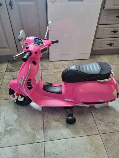Pink girl's motorbike