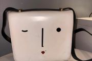 Iconic Lulu Guinness winking face bag