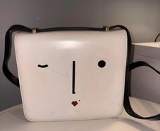 Iconic Lulu Guinness winking face bag