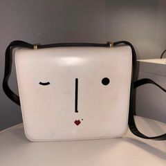 Iconic Lulu Guinness winking face bag