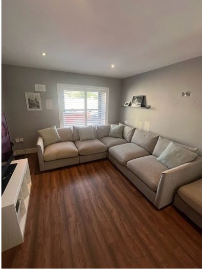 Corner sofa w/footstool