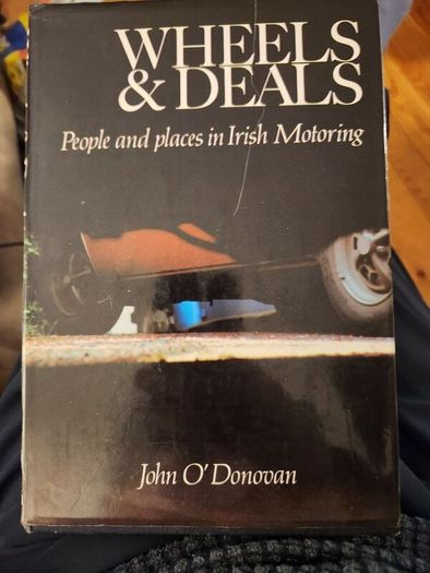 Wheels And Deals. People And Places In Irish Moterong. By John O' Donovan. First Edition Hardback With Dustjacket In Good Condition.