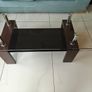 Glass coffee table with dark wood base Image 2