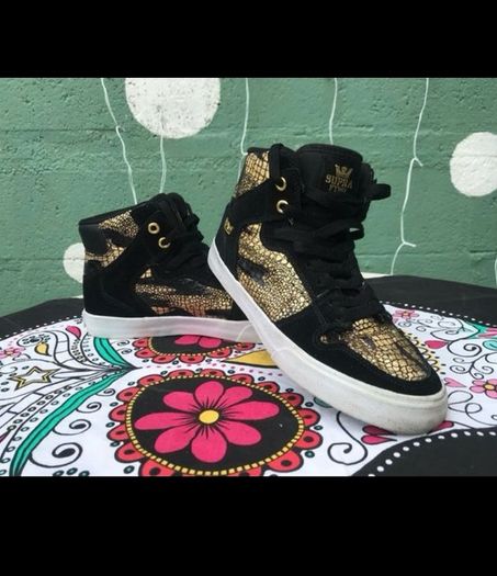 SUPRA black & gold high top trainers