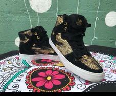 SUPRA black & gold high top trainers