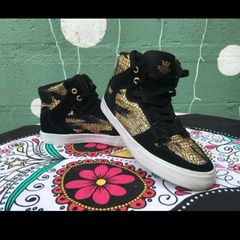 SUPRA black & gold high top trainers