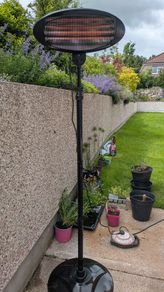 Adjustable height outdoor heater