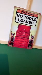 No tools loaned tin metal sign