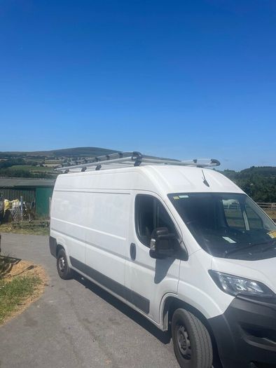 Rhino roof rack and ladder like new