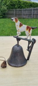 Vintage door bell with a dog figurine