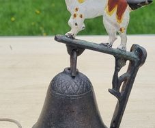 Vintage door bell with a dog figurine