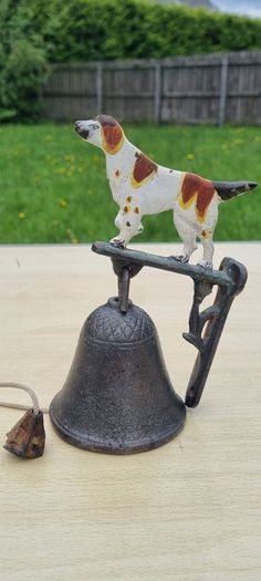 Vintage door bell with a dog figurine