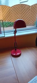 red adjustable study lamp
